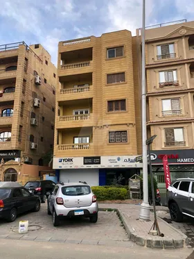 عمارة للبيع ٦ أكتوبر الحى الثالث المحور المركزي الرئيسي طريق النصر 