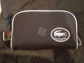 LaCoste toiletry or make up bag