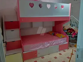 سرير اطفال بدورين
