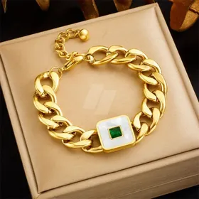 . سوار السلسلة العريض لأبيض و حجر زمرد أخضر مركزي