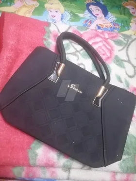 شنطته حريمي جلد حجم كبير