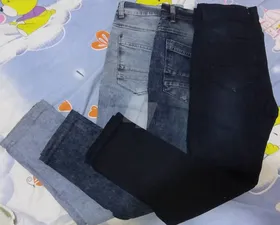 تيشرتات وقمصان وبناطيل جينز