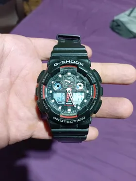 ساعه جي شوك G A 100